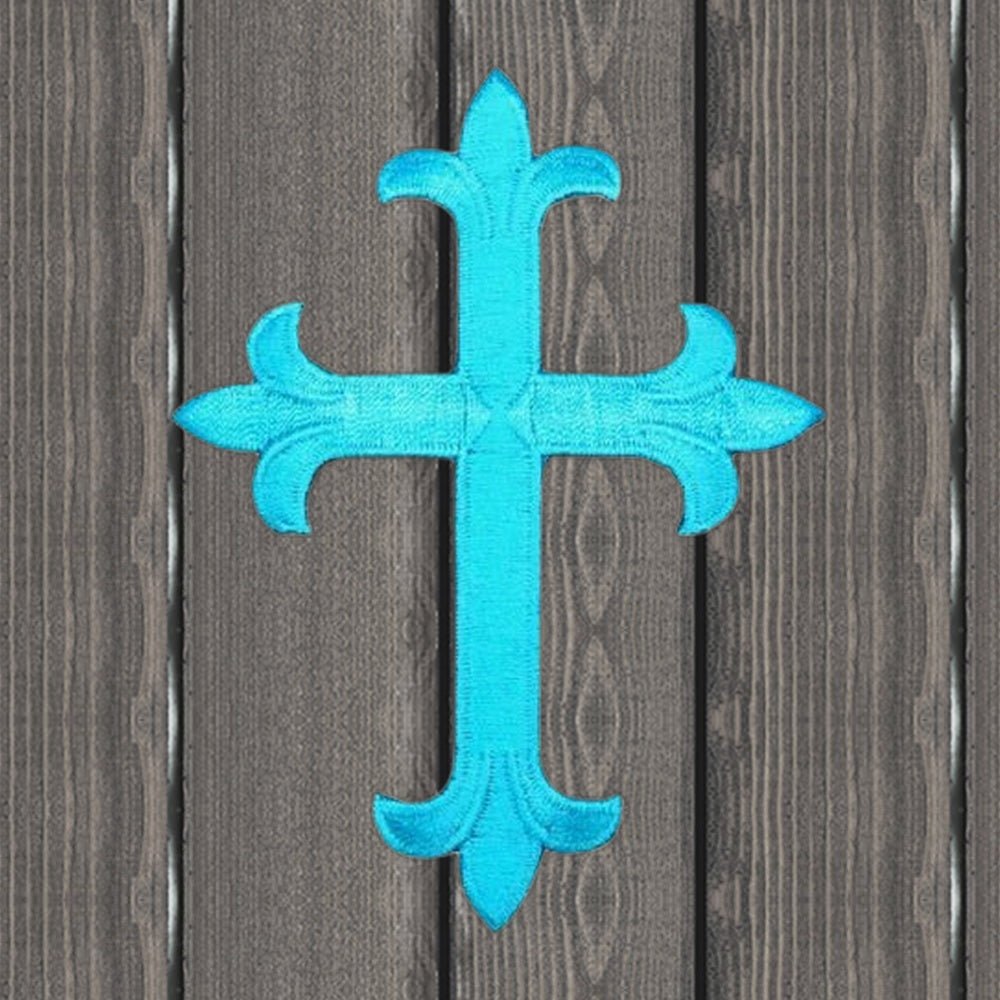 Cross Embroidered Patch - Cyan Blue, Large 4" - Iron On - wood background