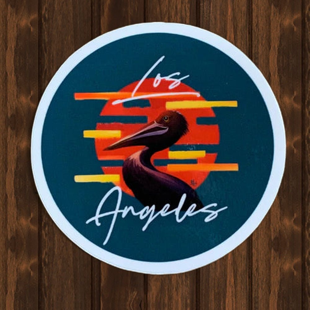 Los Angeles Pelican Vinyl Sticker - wood background