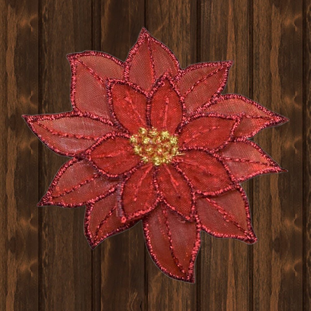 Poinsettia Embroidered Patch - 1.75" - Iron On - wood background