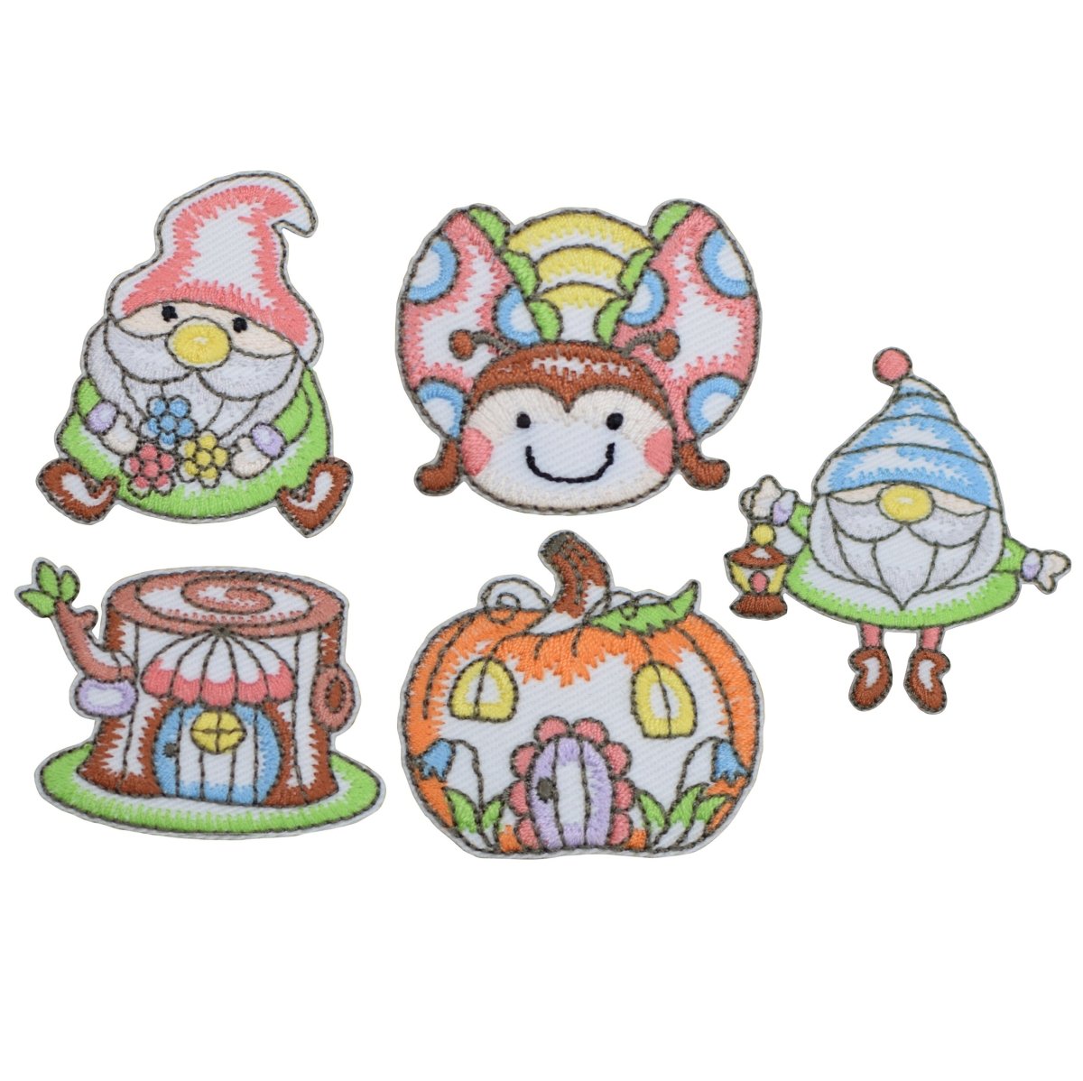 A group of five embroidered patches with a whimsical theme: two garden gnomes (one sitting and holding flowers, one standing with a lantern), a ladybug face, a tree stump house, and a pumpkin house.