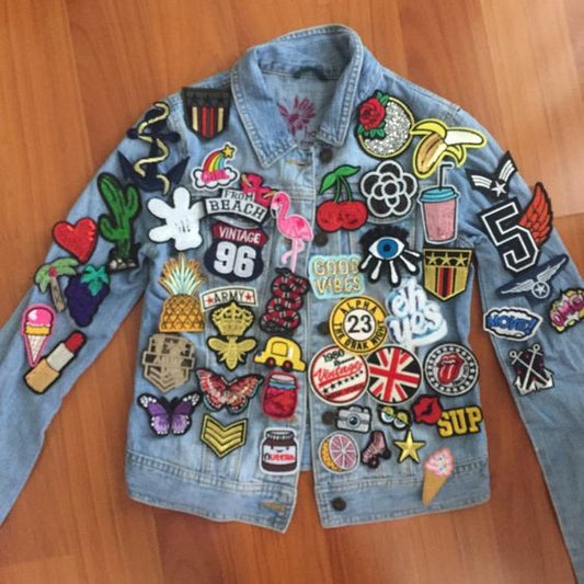 Denim jacket with lots of embroidered patches