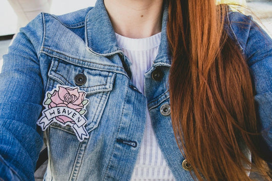 woman wearing blue denim faded jacket
