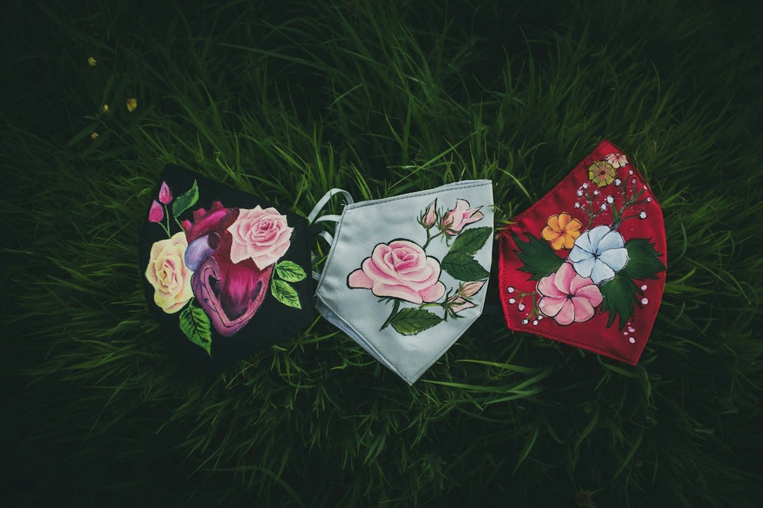white red and green floral paper bag on purple flower