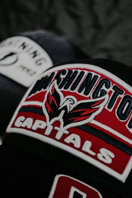 a black hat with a washington capital on it