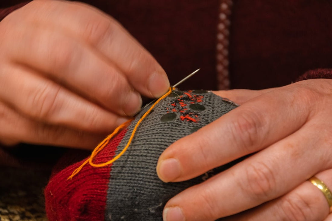 a close up of a person using a pair of scissors