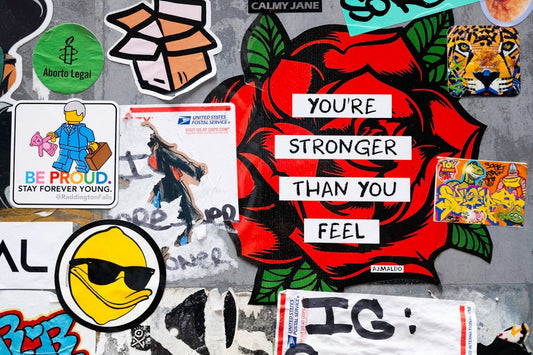 Stickers on a wall with you're stronger than you feel