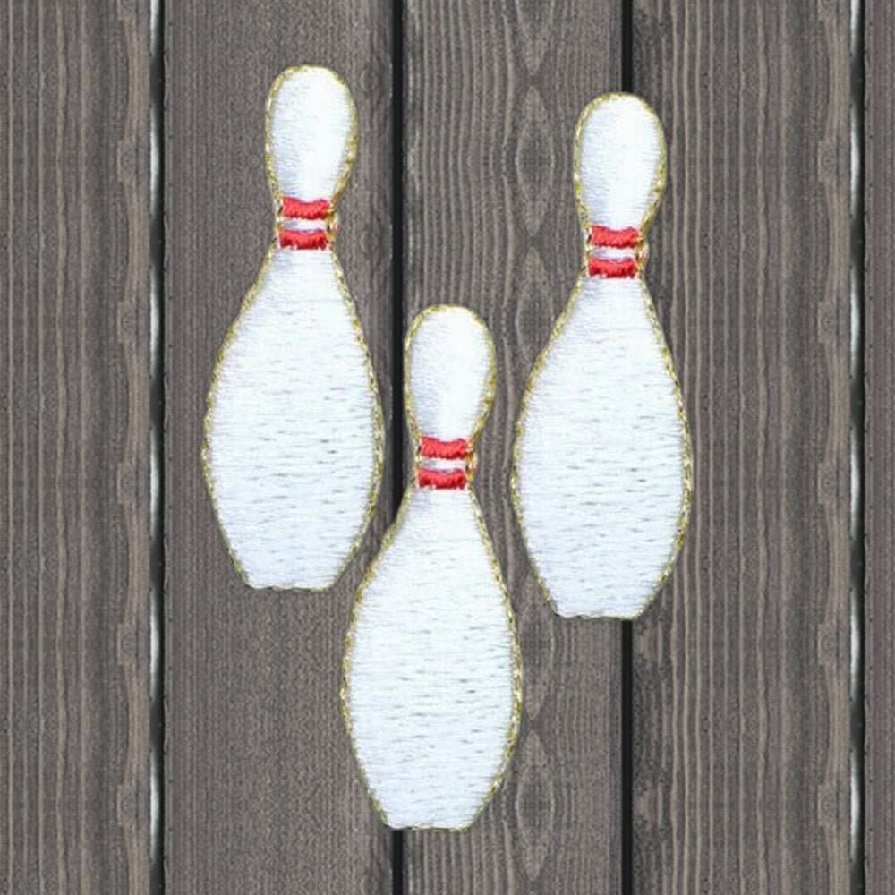 Medium Bowling Pin Applique Patch - 1-7/8" - Iron On - wood background