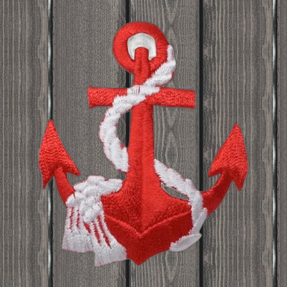 Red Anchor with White Rope Embroidered Patch - Nautical Sailing Badge - wood background