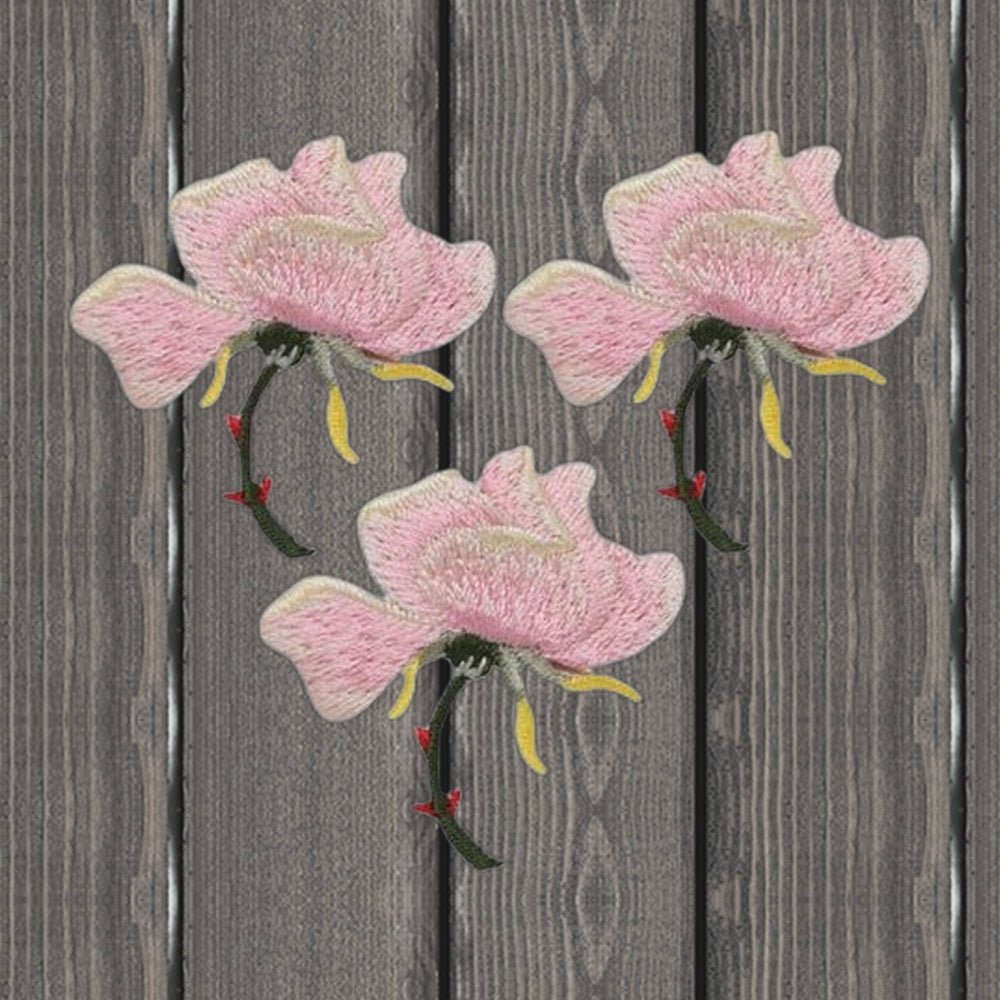 Pink Rose Embroidered Patch Set - 3-Pack, 1-3/8 inches - Iron On - wood background