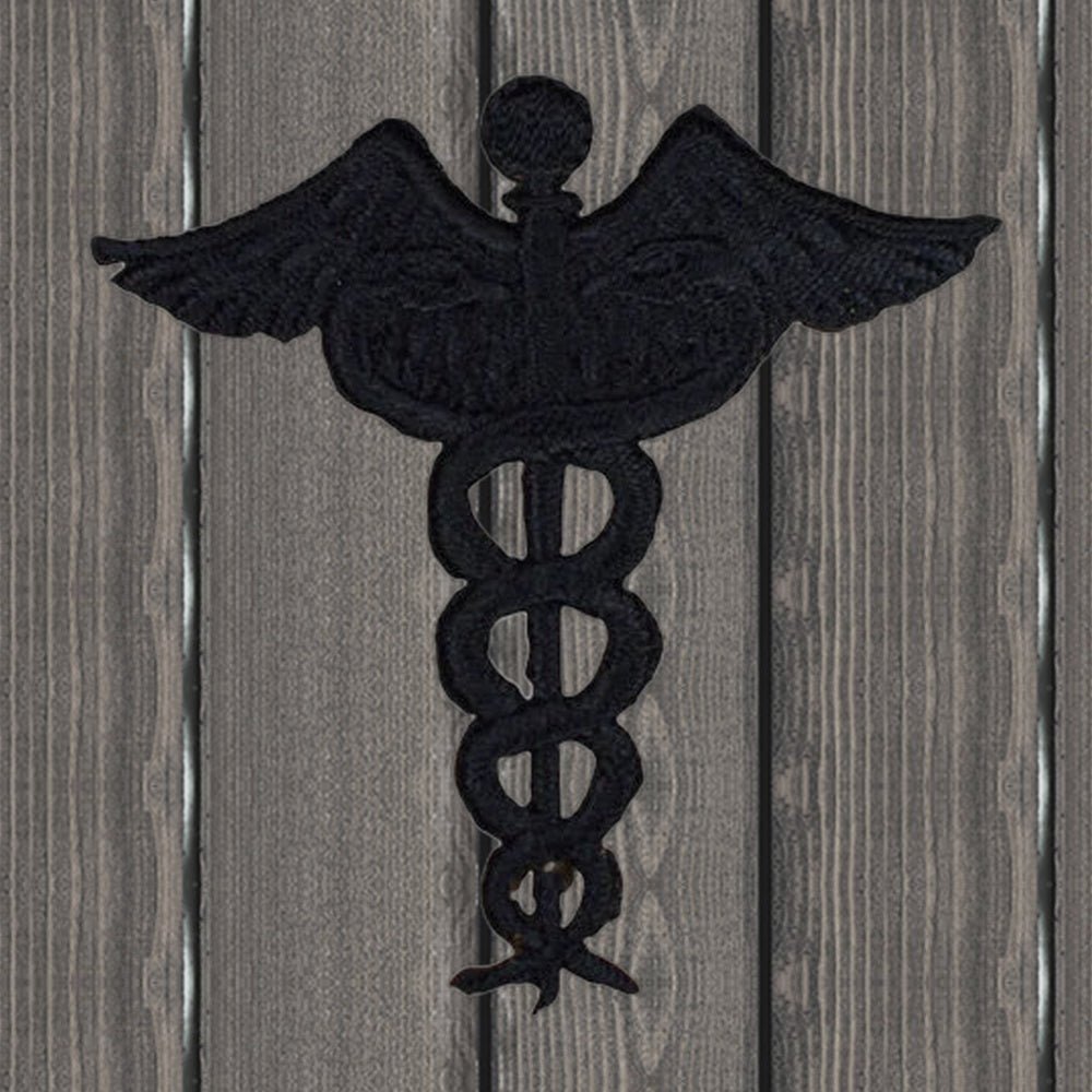 Black Caduceus Embroidered Patch - 2.25" Black - Iron On - wood background