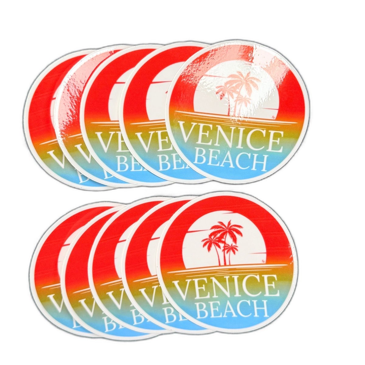 Ten round Venice Beach vinyl stickers with palm trees, sunset colors and white lettering.
