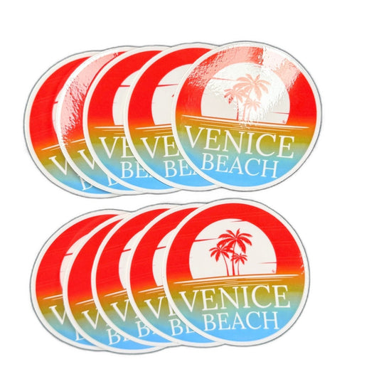 Ten round Venice Beach vinyl stickers with palm trees, sunset colors and white lettering.
