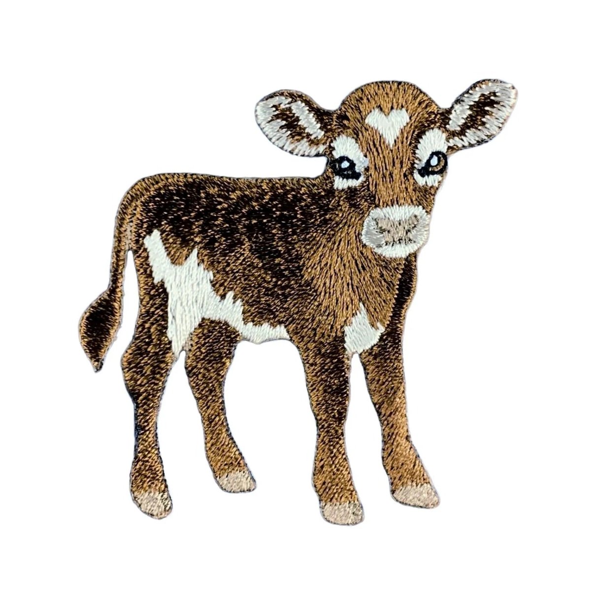 Embroidered patch of a cute brown and white calf baby, shown on a solid white background.