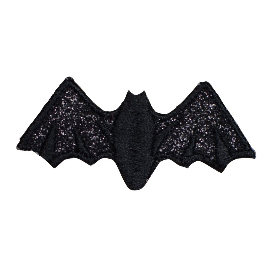 Black bat-shaped patch on a white background