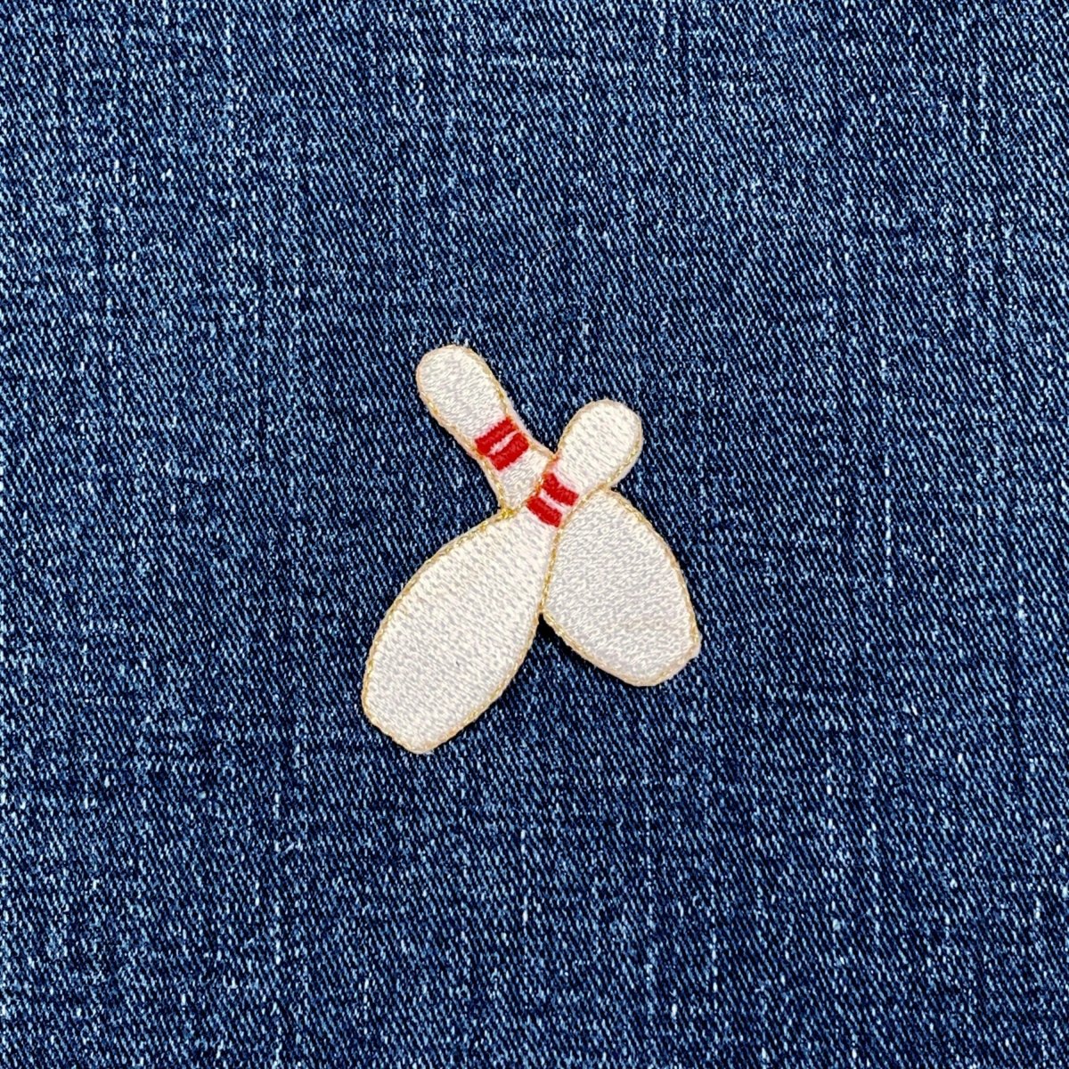 Bowling pin patch on denim fabric