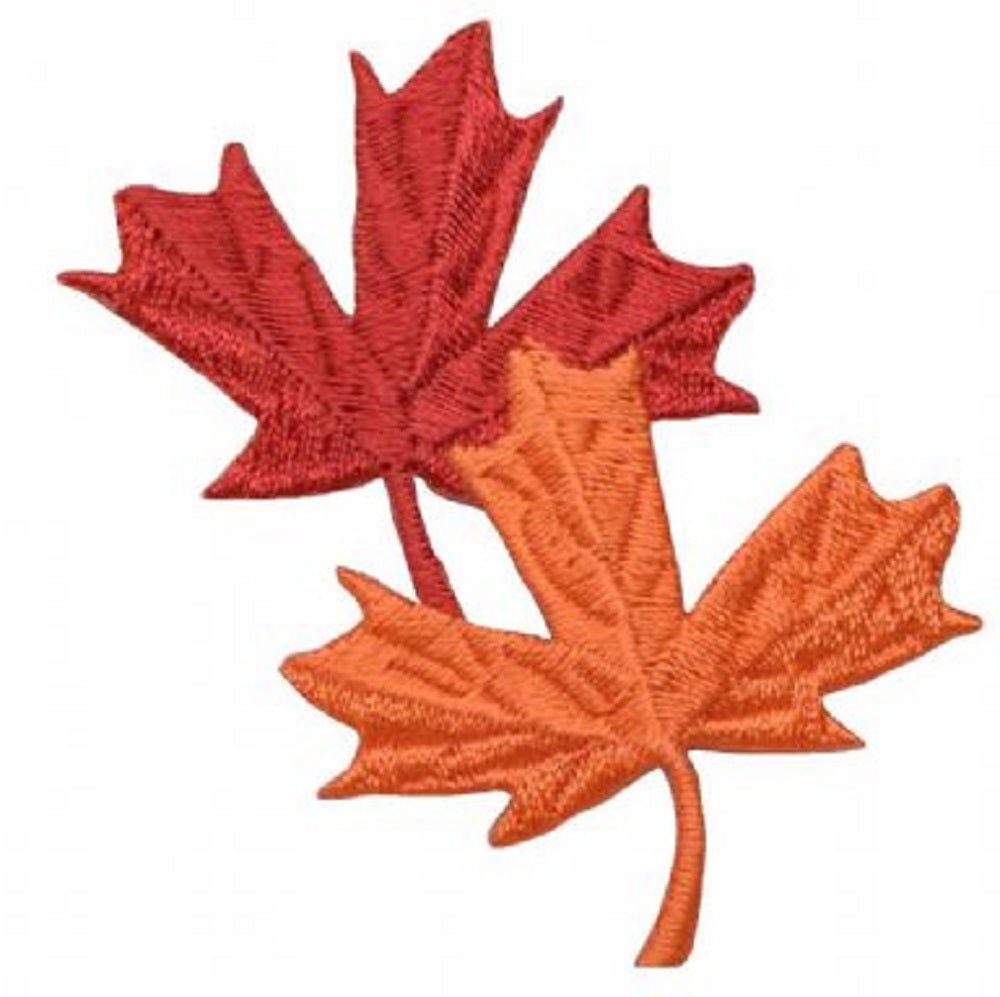 A patch with two embroidered leaves, one red and one orange, resembling autumn leaves.