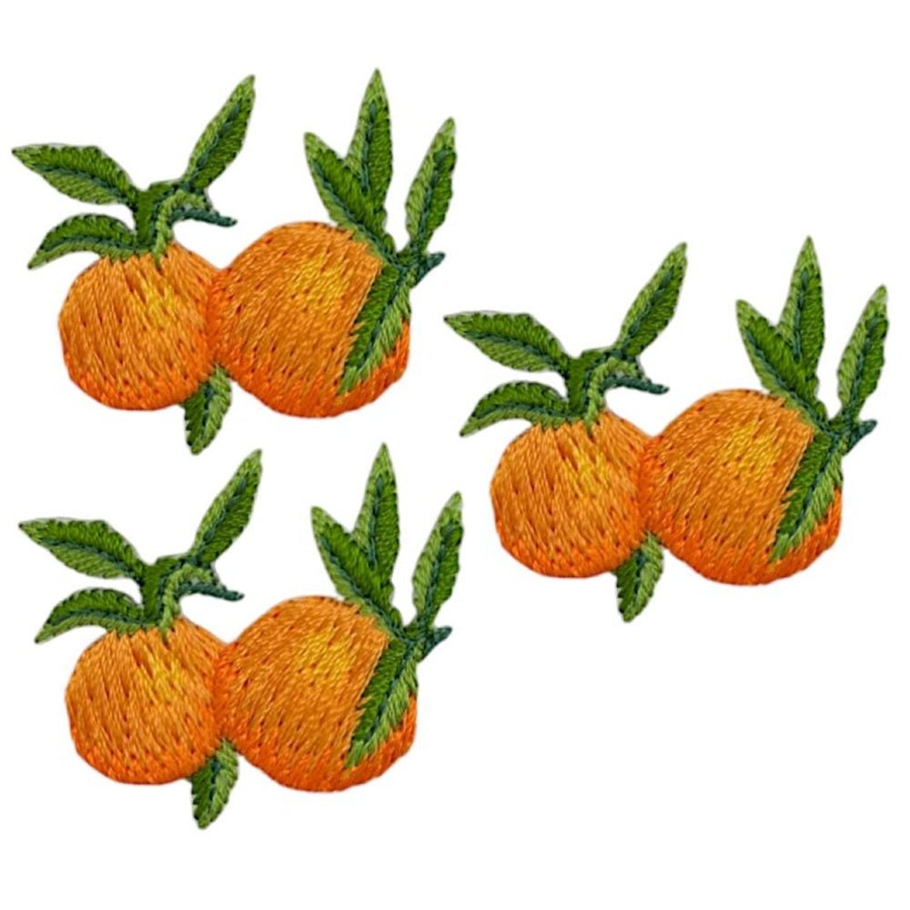 three embroidered orange fruit patches 