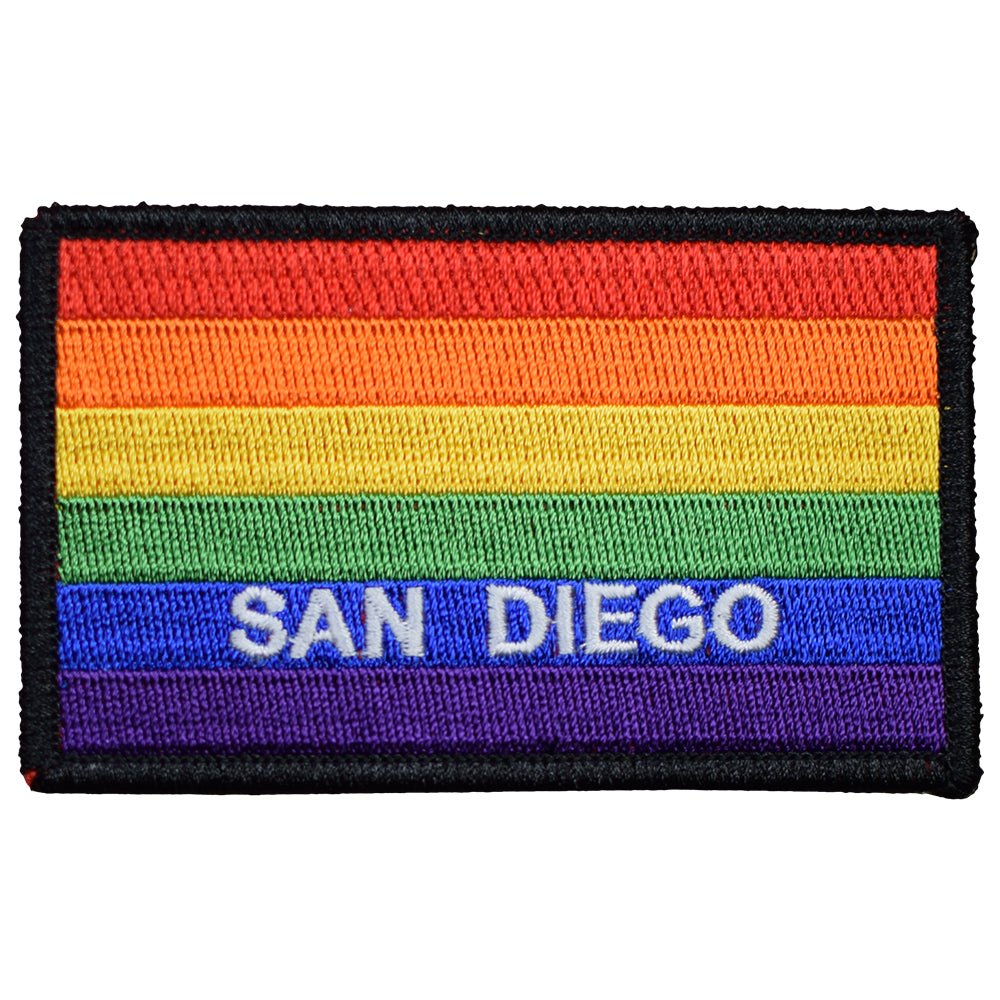 A rectangular patch shaped like flag with a rainbow color scheme and the text 'SAN DIEGO' across the middle in white.