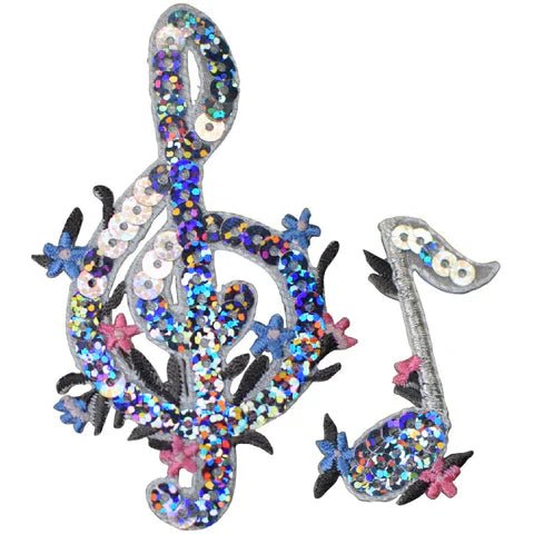 Two sequin music patches: a G clef and a single musical note