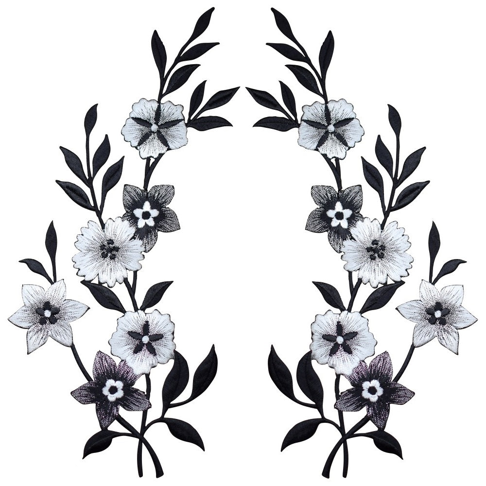2 Intricate, symmetrical embroidered appliqué patches, featuring two vertical branches each of black and white flowers and black leaves.