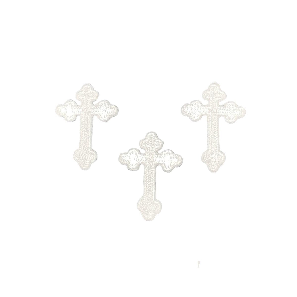 3 White cross-shaped patches on a blue white background