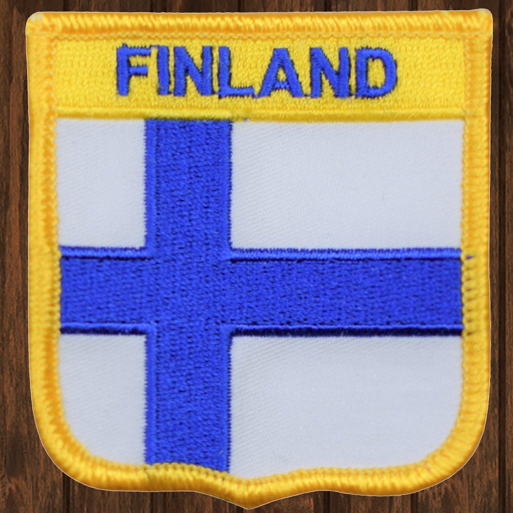 embroidered iron on sew on patch finland shield