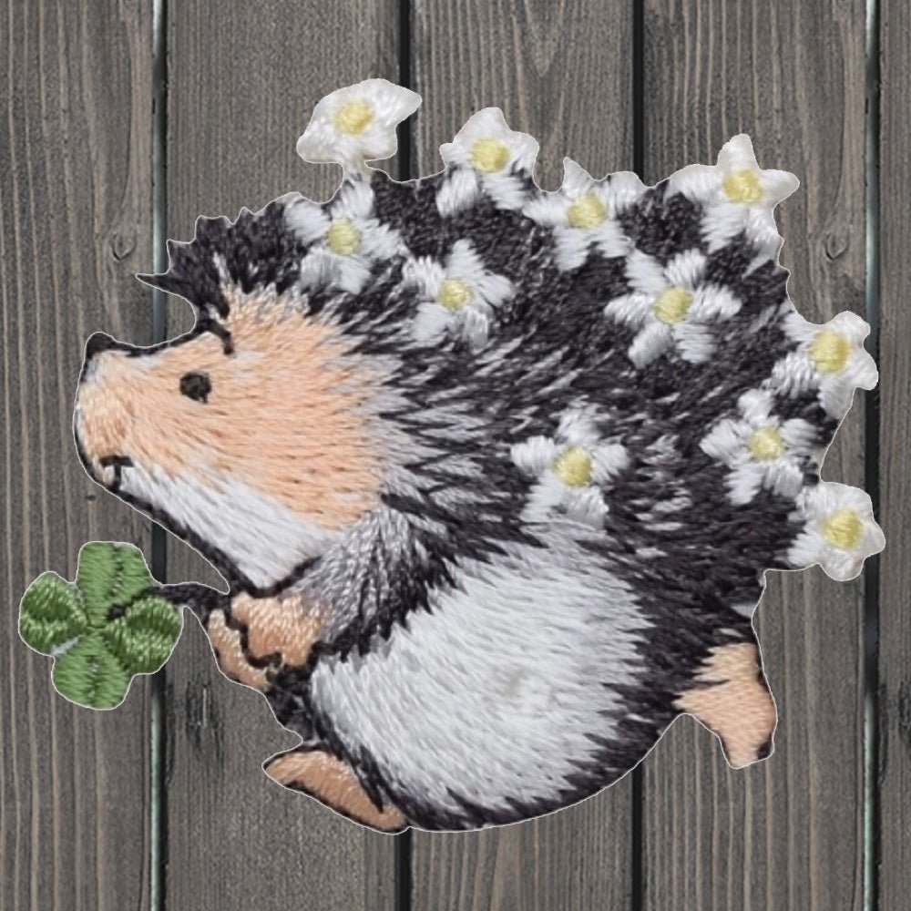 Hedghog holding shamrock clover with flowers on back embroidered applique patch