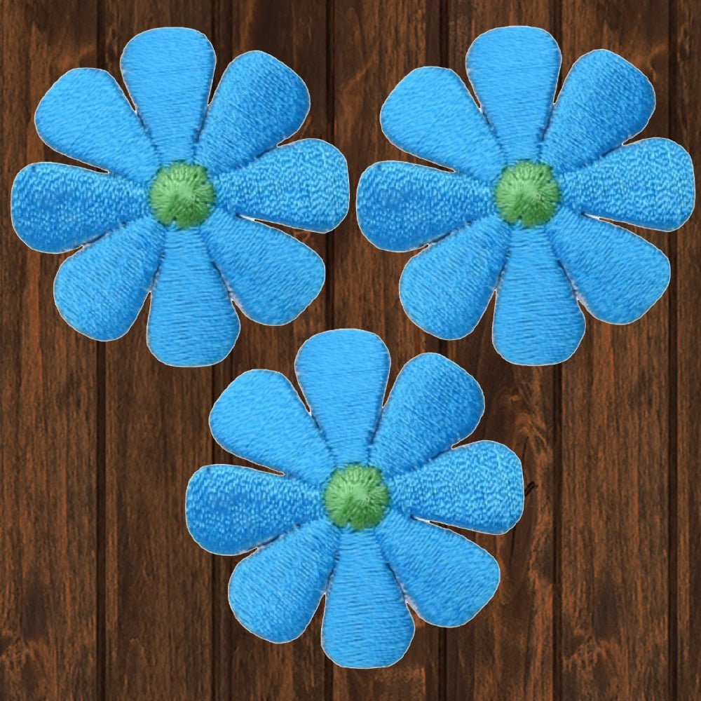 embroidered iron on sew on patch medium turquoise blue daisy flower