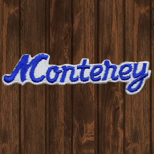 embroidered iron on sew on patch monterey blue script